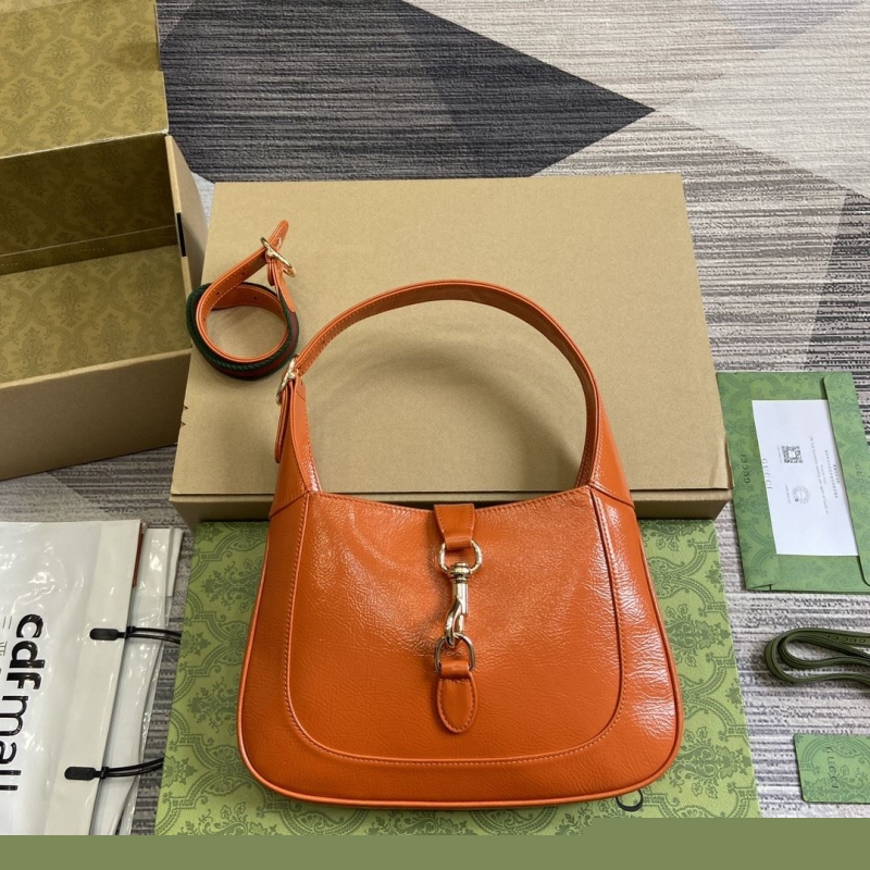 G*u*i top handle bags